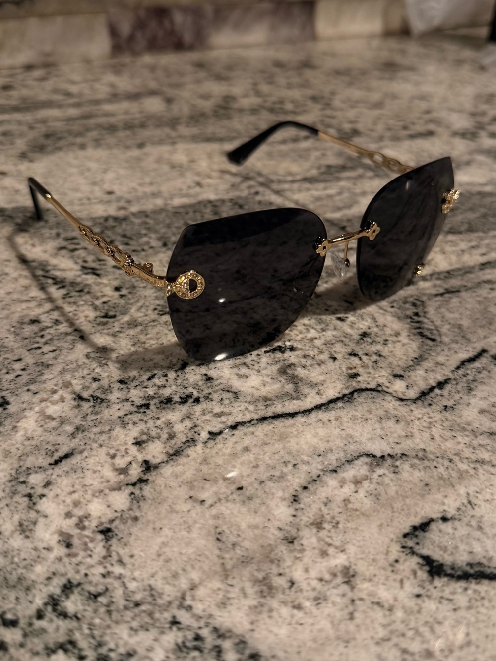 CHANEL Black Lensed Sunglasses with Gold Accents - Women's Accessories
